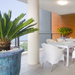 Balcony Redcliffe Blue Urn with Cycad overlooking sea at Redcliffe