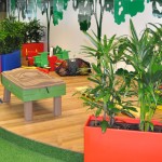 Kiddy Stage Low stage surrounded by Urban 10 planters