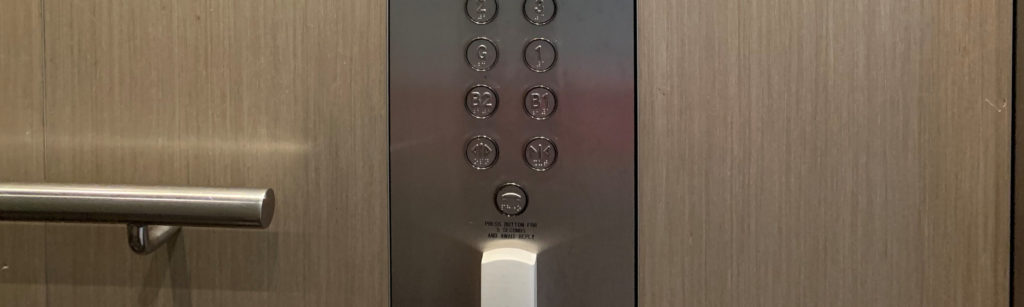 Showing the lift controls t Portside Hamilton building.